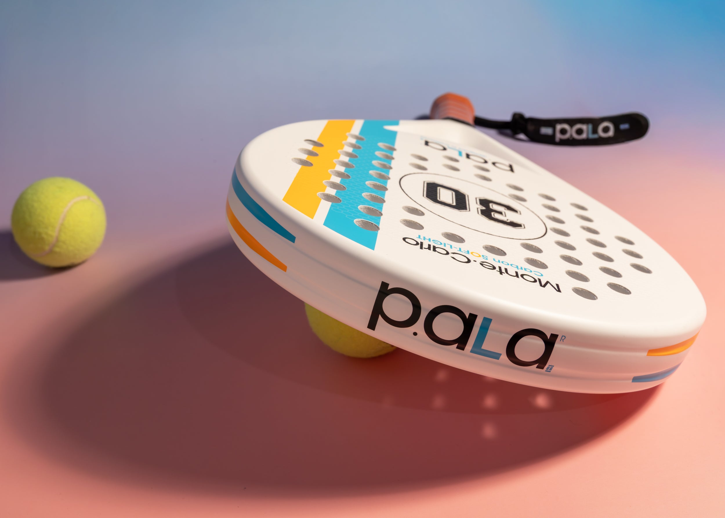 Pala paddle with a tennis ball on a gradient background