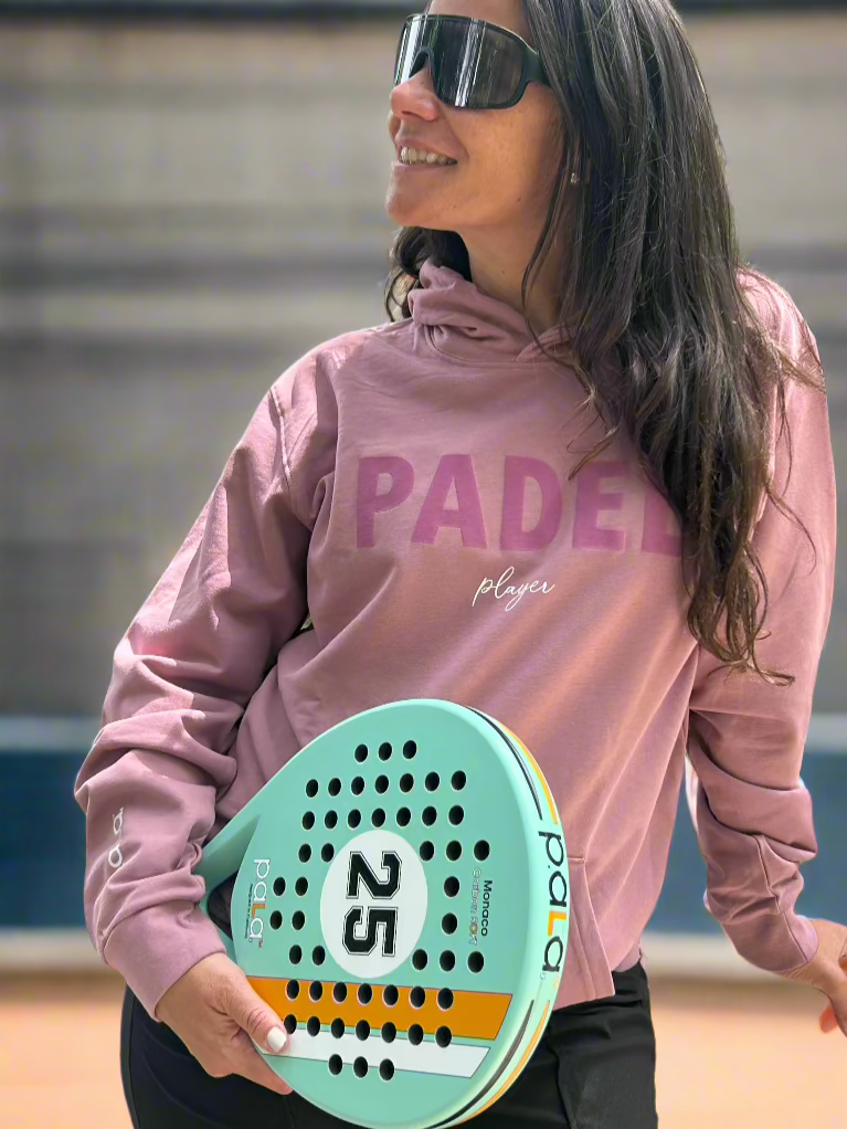 woman holding a padel racket with padel logo padel player