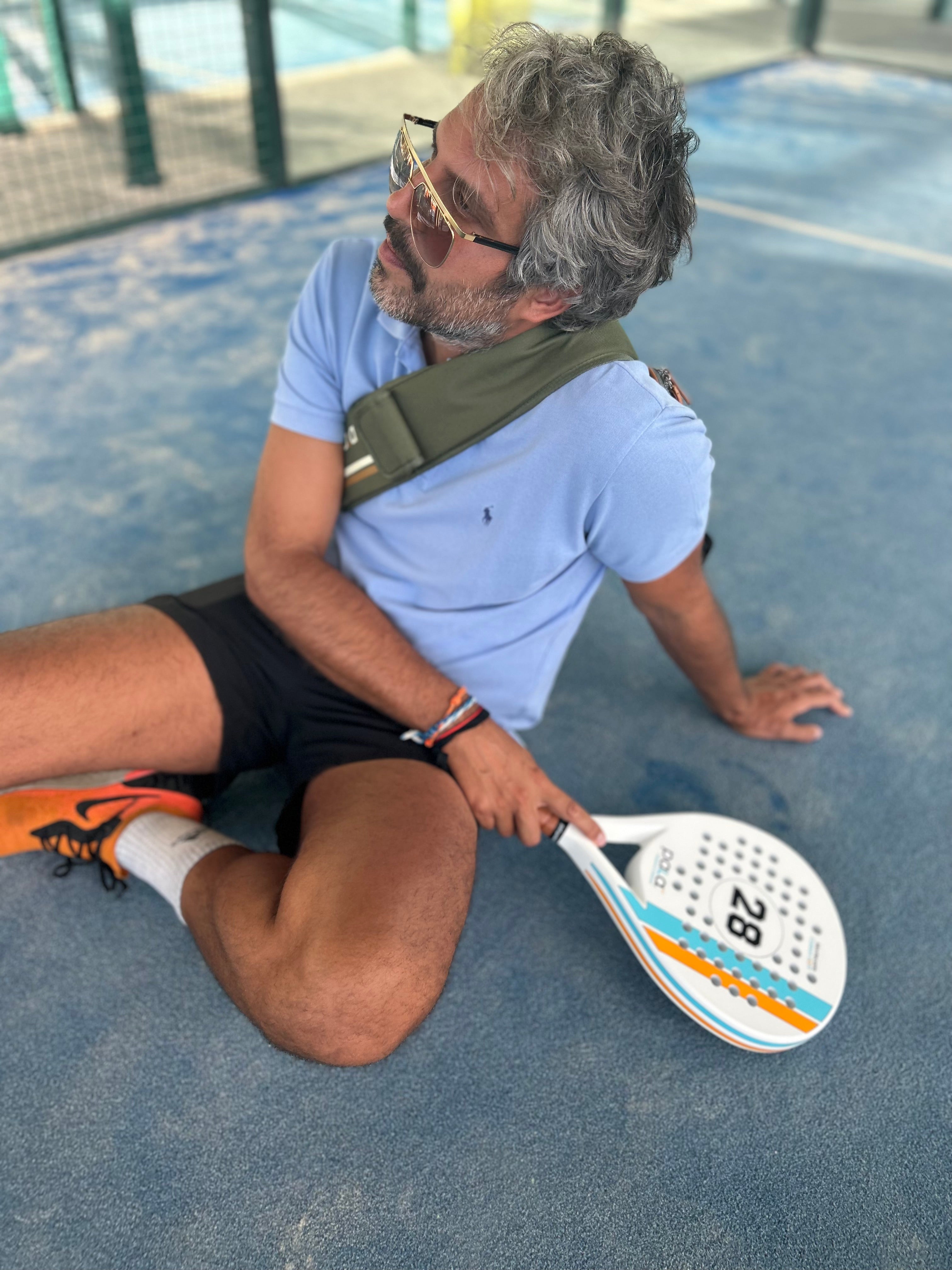 PALA PADEL RACKET ON THE PADEL COURT FOR NEW PADEL PLAYER