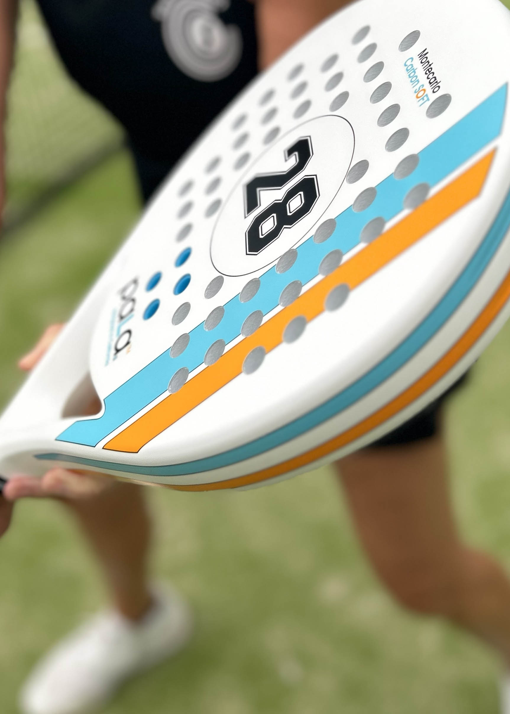 PALA PADEL RACKET DETAIL SHOWING DETAIL OF HOLE DISTRIBUTION