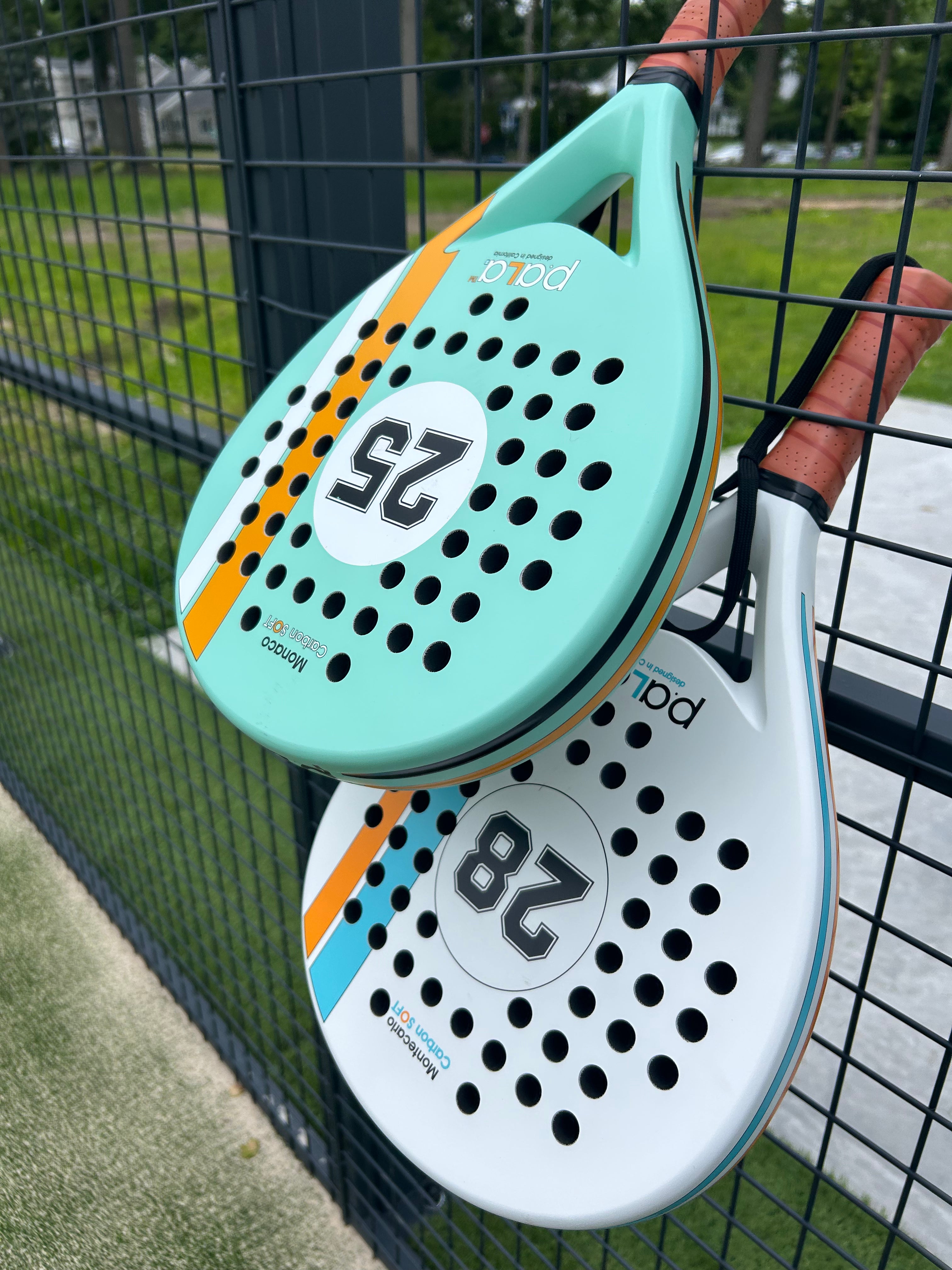 P.ALA padel rackets set in aqua and white, ideal for doubles play and beginner players seeking power and precision