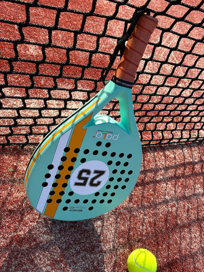 PALA Aqua 25 Padel Racket with a lightweight carbon fiber design, perfect for beginner players placed on a new padel court 