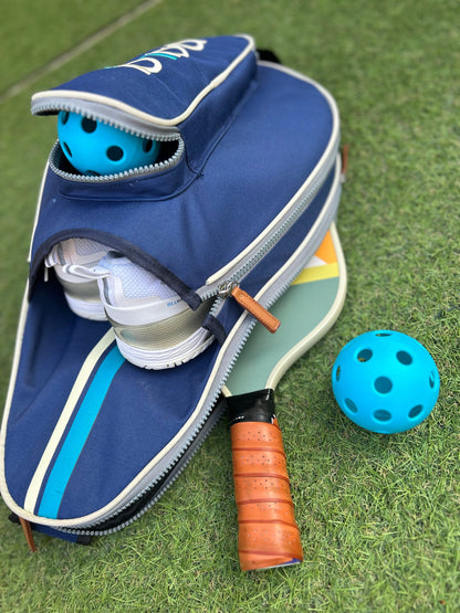 Modern blue pickleball bag with space for rackets and accesories