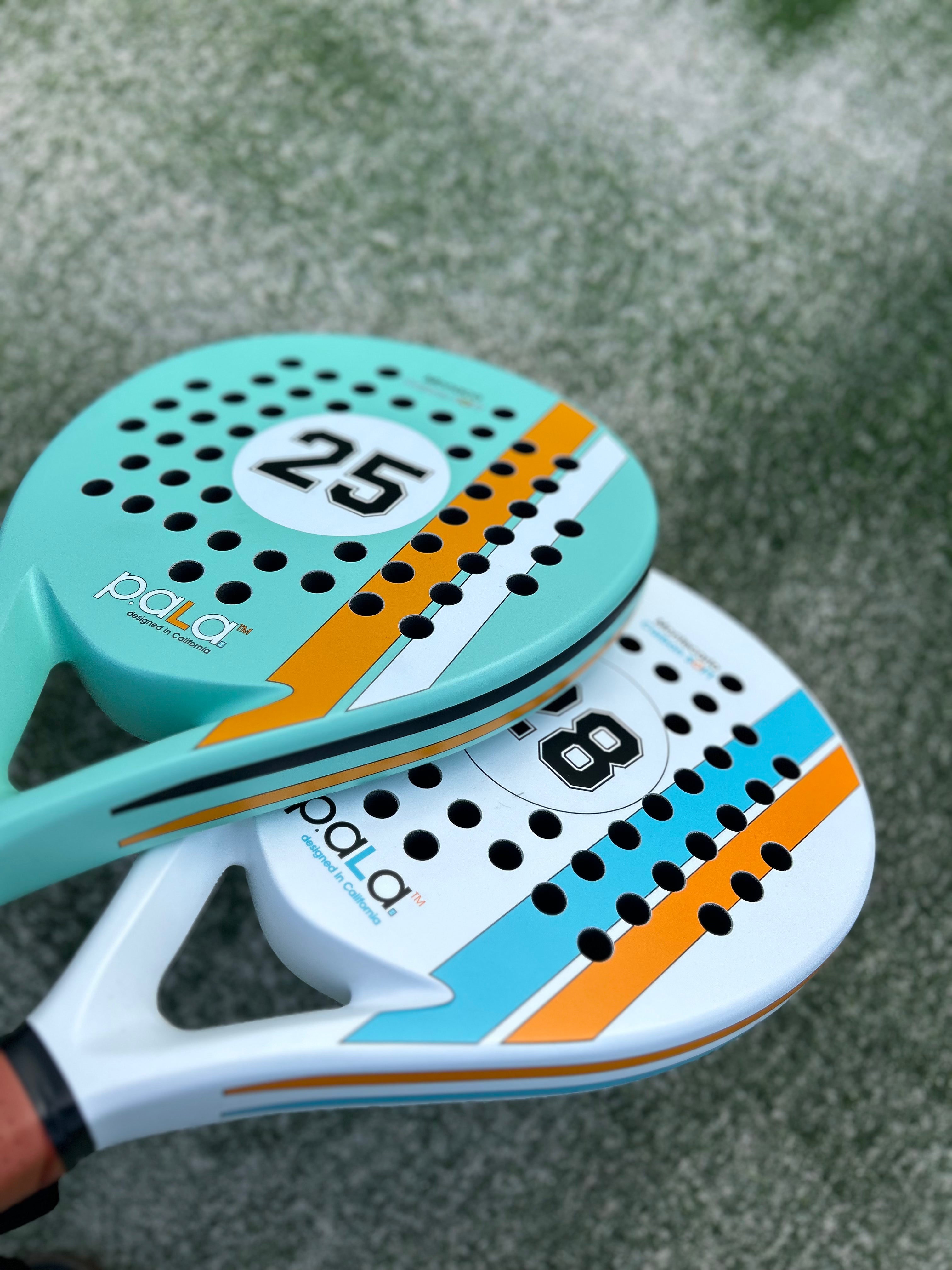 Detail of 2padel rackets with leather-like grips, perfect for enhancing your game on the padel  court