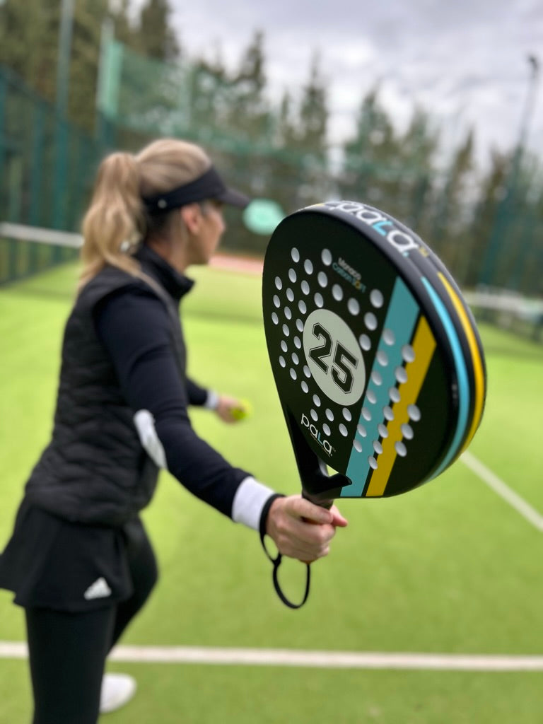 PALA PADEL RACKET with number 25 for 2025 with woman player on a green padel court in the usa